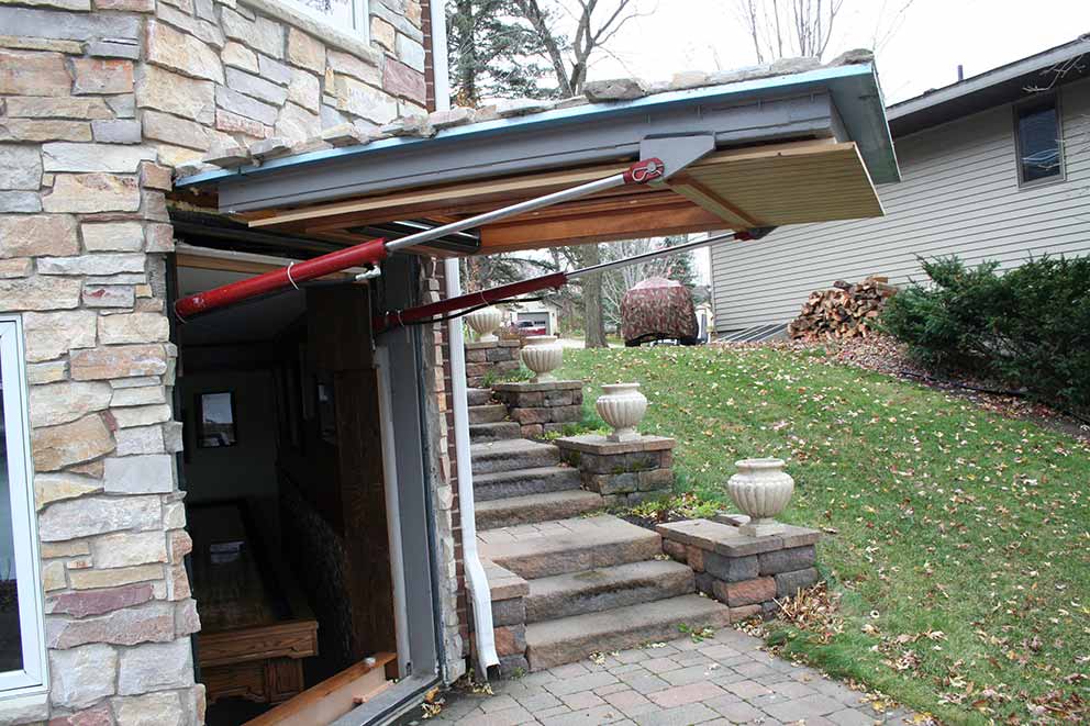 Custom designer hydraulic door for residential